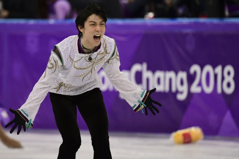 Japan's Yuzuru Hanyu celebrates after the men's single skating free skating at the Pyeongchang 2018 Winter Olympic Games at the Gangneung Ice Arena in Gangneung on February 17, 2018