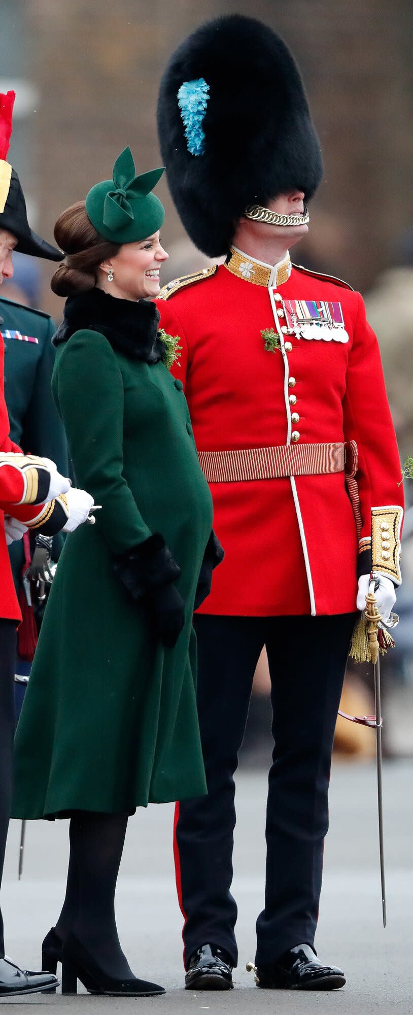 Catherine, Duchess of Cambridge presents sprigs of shamrock to soldiers of 1st Battalion Irish Guards during the annual Irish Guards St Patrick's Day Parade at Cavalry Barracks on March 17, 2018 in Hounslow, England.