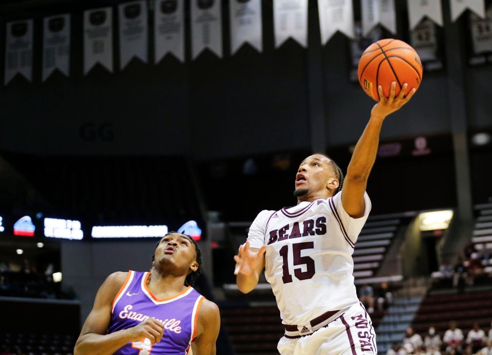 Missouri State senior Matthew Lee takes the ball to the basket as the Bears take on the Evansville Purple Aces at Great Southern Bank Arena on Wednesday, Nov. 29, 2023.