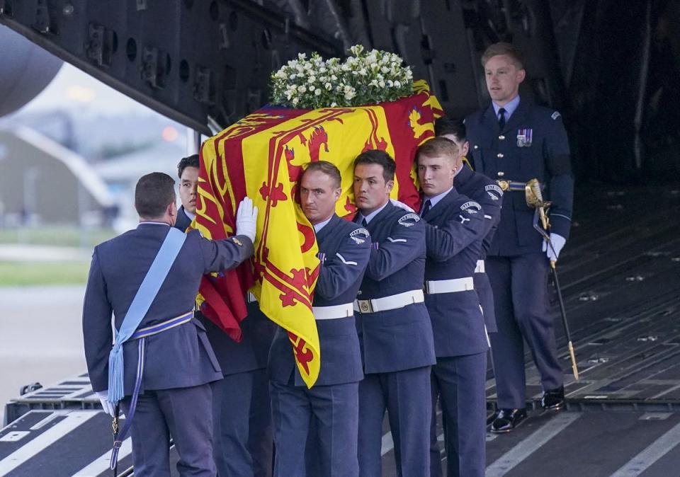 The bearer party from the Queen’s Colour Squadron carry the Queen’s coffin to the state hearse (Arthur Edwards/The Sun) (PA Wire)