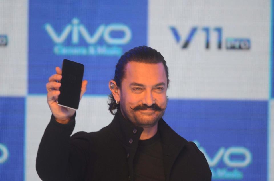 <p>Actor Aamir Khan launches Vivo V11 Pro smartphone, in Mumbai, on September 6, 2018. (Photo: IANS) </p>