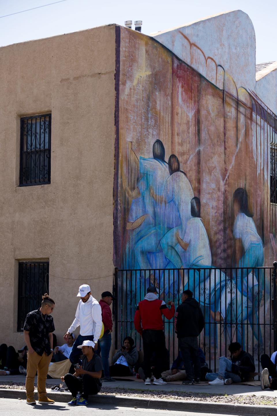 Venezuelan migrants are staying in the area of Sacred Heart Catholic Church in Downtown El Paso.