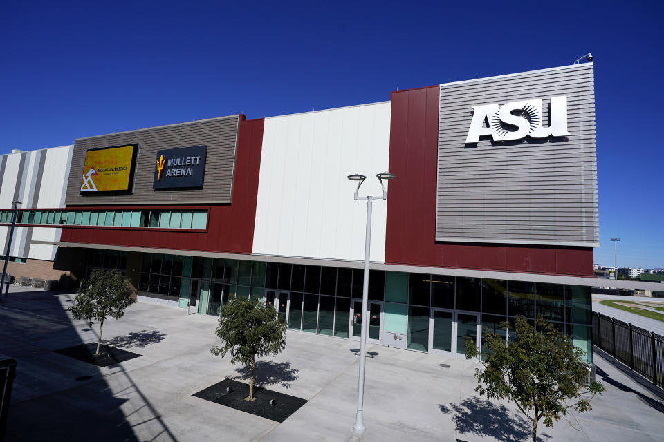 An exterior view of the Arizona Coyotes NHL hockey team's new temporary home, the new Mullett Arena, Monday, Oct. 24, 2022, in Tempe, Ariz. The Coyotes will be sharing arena with Arizona State University. (AP Photo/Ross D. Franklin)