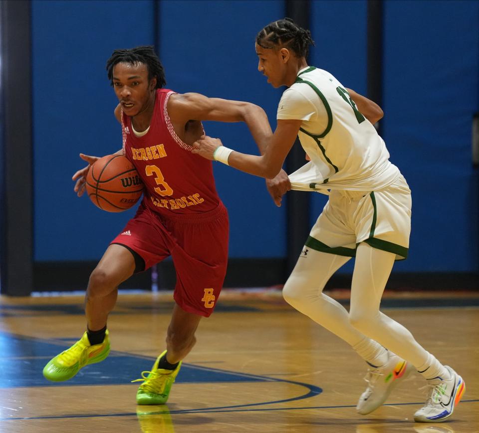Jaylen Robinson of Bergen Catholic is guarded by  Nathaniel Burleson of Ramapo as Robinson heads down court in the second half as Bergen Catholic defeated Ramapo 71-57 to win the semi final in the Bergen Jamboree played in Hackensack, NJ on February 11, 2023.