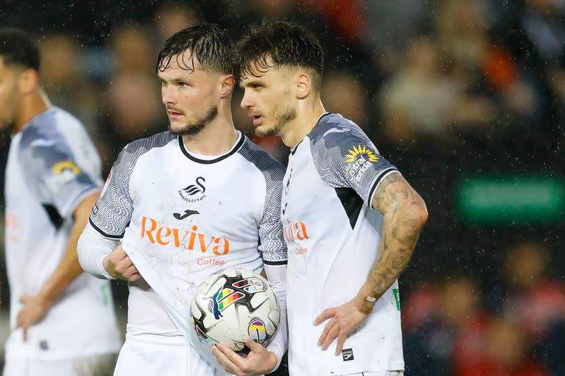 Liam Cullen is set to remain with the club for another 12 months, but there are still some questions over the future of Jamie Paterson and several others -Credit:Huw Evans Picture Agency