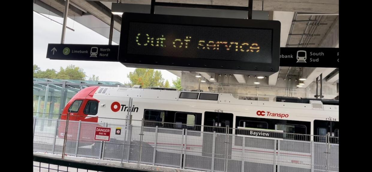 A Trillium Line train is seen at Bayview station in Ottawa on Oct. 1, 2023. The north-south rail line may not open until September, two years later than originally planned. (Andrew Foote/CBC - image credit)