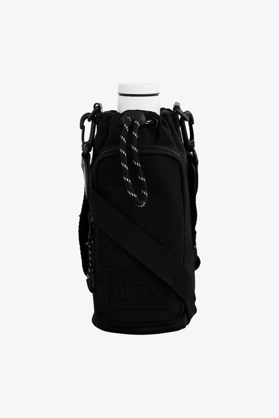 <p><a href="https://go.redirectingat.com?id=74968X1596630&url=https%3A%2F%2Fbeistravel.com%2Fproducts%2Fthe-water-bottle-sling-in-black&sref=https%3A%2F%2Fwww.cosmopolitan.com%2Fstyle-beauty%2Ffashion%2Fg44878272%2Fgifts-for-people-who-have-everything%2F" rel="nofollow noopener" target="_blank" data-ylk="slk:Shop Now;elm:context_link;itc:0;sec:content-canvas" class="link ">Shop Now</a></p><p>The Water Bottle Sling in Black</p><p>beistravel.com</p><p>$44.00</p><span class="copyright">Béis</span>