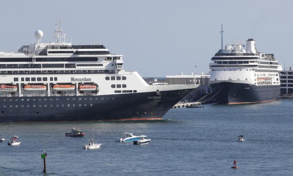 The Rotterdam, left, passes the Zaandam at Port Everglades in Florida.