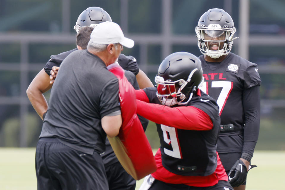 Atlanta Falcons linebacker Lorenzo Carter reacts as he works on a drill during the last day of OTA at Falcons training facilities in Flowery Branch on Thursday, June 9, 2022. (Miguel Martinez/Atlanta Journal-Constitution via AP)