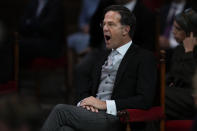 Caretaker Dutch Prime Minister Mark Rutte jokes prior to Dutch King Willem-Alexander's speech which marks the opening of the parliamentary year outlining the government's budget plans for the year ahead at the Grote Kerk, or Sint-Jacobus Kerk, (Great Church or St. James' Church) in The Hague, Netherlands, Tuesday, Sept. 21, 2021. (AP Photo/Peter Dejong)