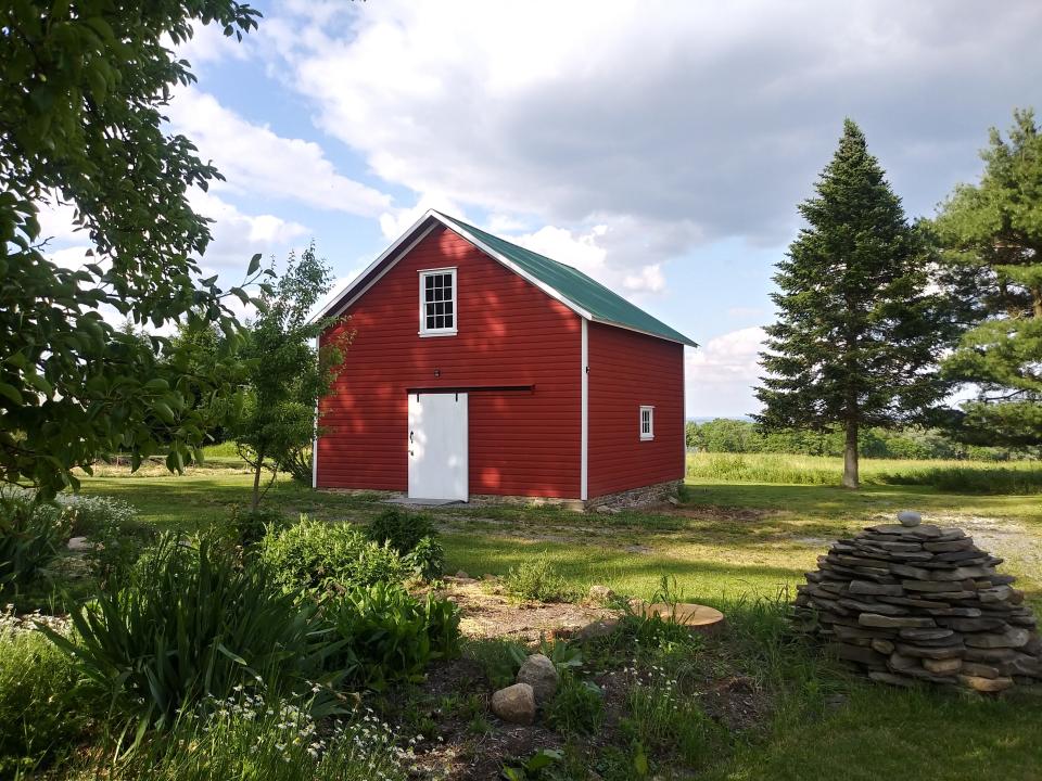 A barn in Trumansburg that was restored this year using original framing built by Alvin Chase circia 1810-1815, and will be awarded by Historic Ithaca on Thursday.