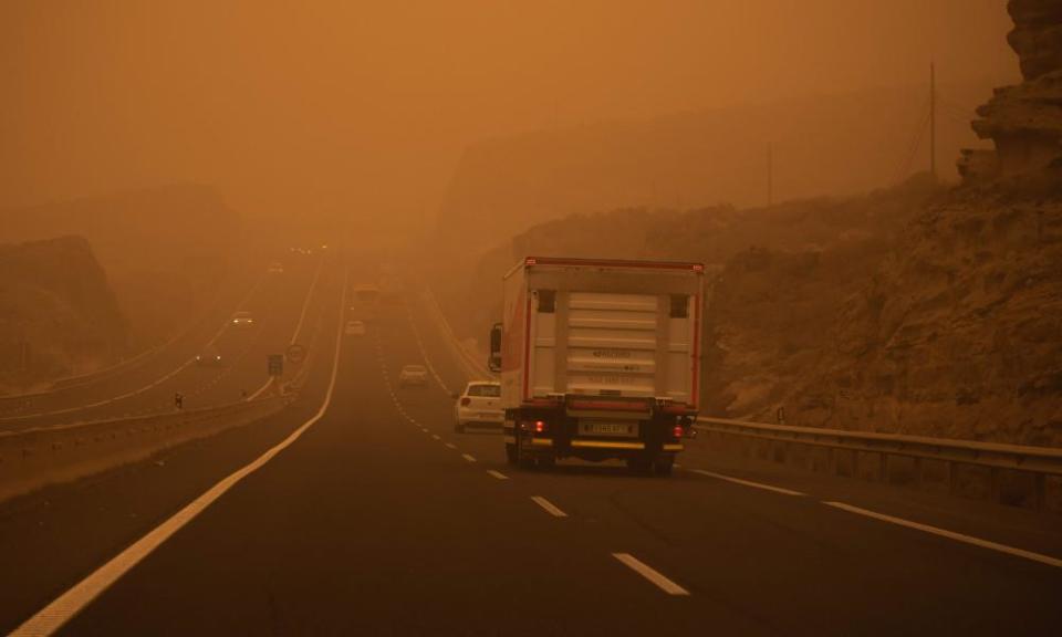 Cars on the TF-1 highway during a sandstorm in Santa Cruz de Tenerife on Sunday.