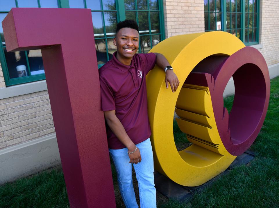 McMurry University graduate Jalen Promesse outside Old Main Friday May 5, 2023.