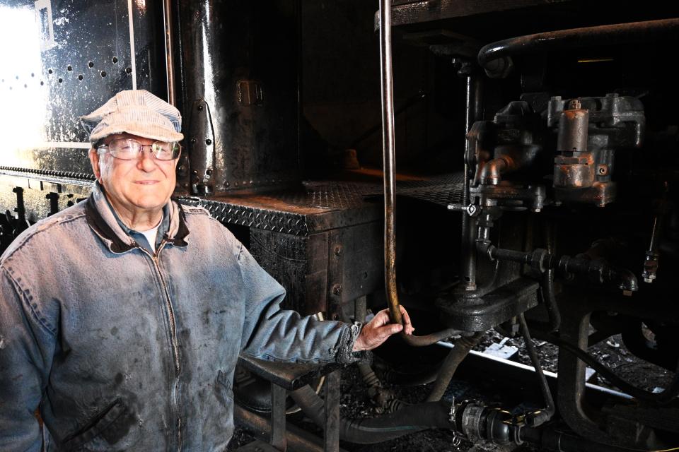 Little River Railroad founder Terry Bloom gets ready to enter the cab of Engine 110.