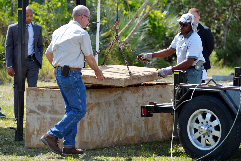 Images from the exhumation of a Jane Doe April 21, 2016, at Winter Beach Cemetery. The unidentified woman (identified March 12, 2024, as Evelyn Lois Horne, 43) was found in a watery ditch on State Road 60 in 1982 and authorities are hoping new technology will lead to closing the 34-year case.