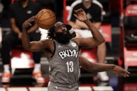 Brooklyn Nets guard James Harden reacts after dunking during the second half of an NBA basketball game against the Miami Heat, Monday, Jan. 25, 2021, in New York. (AP Photo/Adam Hunger)