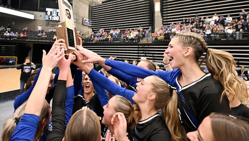 Panguitch players celebrate their win over Rich for the 1A Volleyball championship at UVU on Saturday, Oct. 28, 2023.