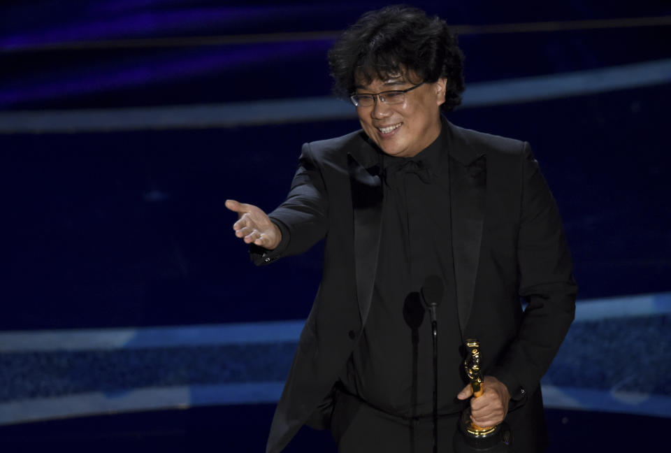 Bong Joon Ho accepts the award for best director for "Parasite" at the Oscars on Sunday, Feb. 9, 2020, at the Dolby Theatre in Los Angeles. (AP Photo/Chris Pizzello)