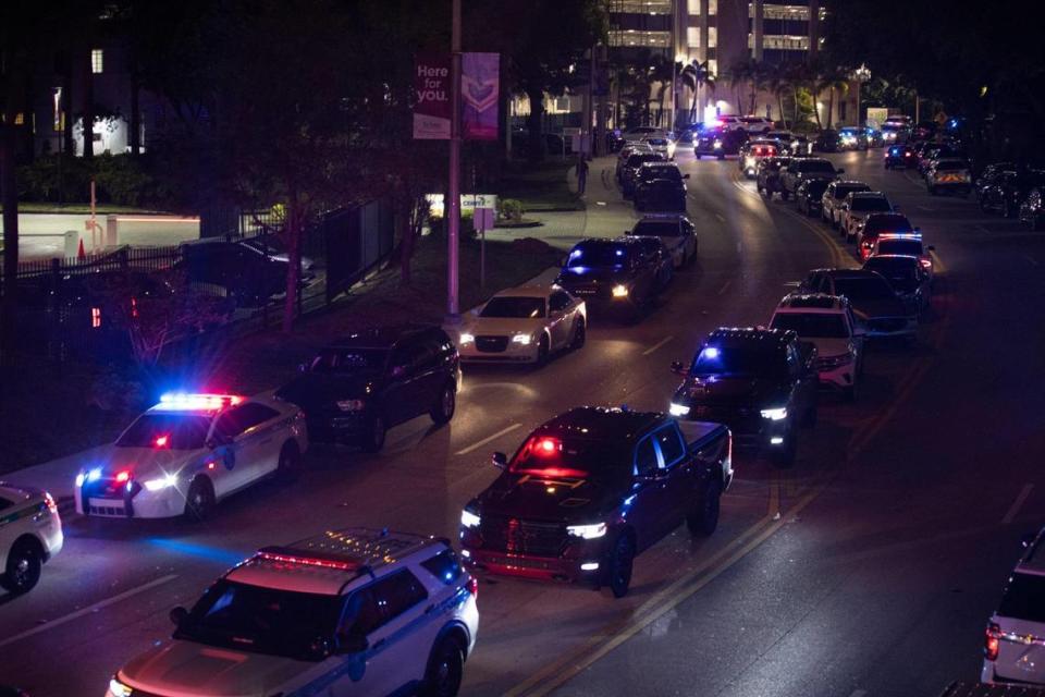 Police officers and other officials stand outside the Ryder Trauma Center after a Miami-Dade police officer what shot on Monday, August 15, 2022.