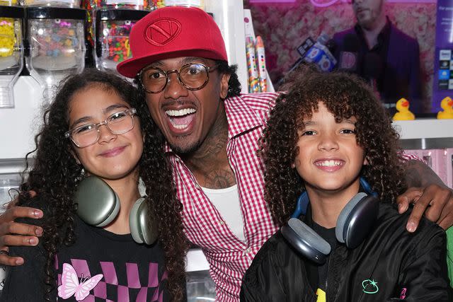 <p>John Nacion/Getty Images</p> Moroccan Cannon, Nick Cannon and Monroe Cannon attend the Natti Natasha & Nick Cannon host Sugar Factory in Times Square on August 11 in New York City