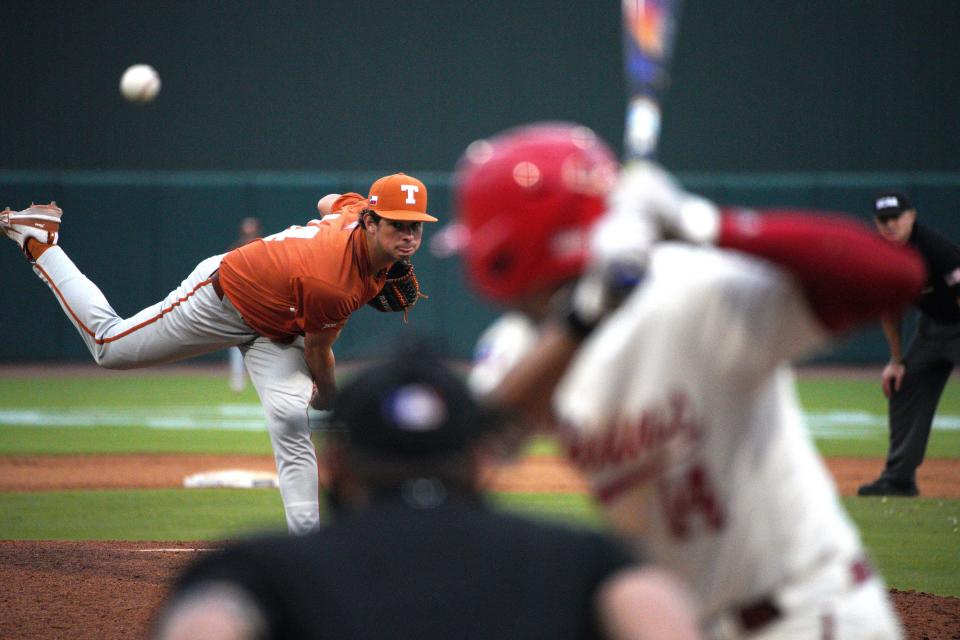 Texas Longhorns infielder Cade Ohara (14) pitches against the Louisiana Ragin Cajuns during the first round in the NCAA baseball College Station Regional May 31, 2024, at Olsen Field College Station.