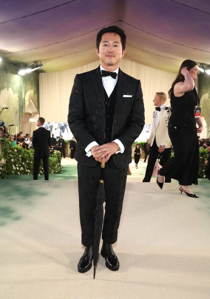 Steven Yeun attends the 2024 Met Gala.