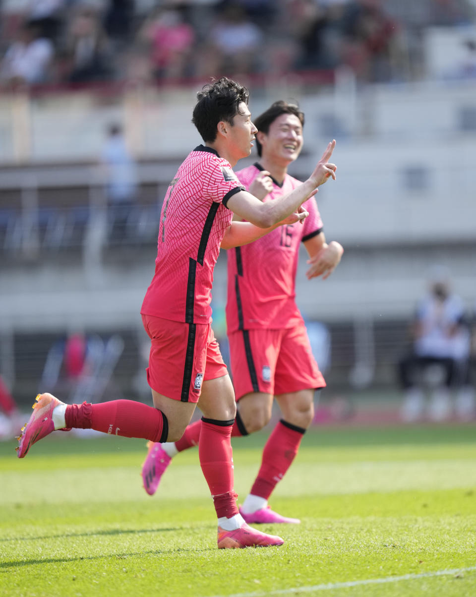 South Korea's Son Heung-min, celebrates after scoring his side's second goal on a penalty kick against Lebanon during their Asian zone Group H qualifying soccer match for the FIFA World Cup Qatar 2022 at Goyang stadium in Goyang, South Korea, Sunday, June 13, 2021. (AP Photo/Lee Jin-man)