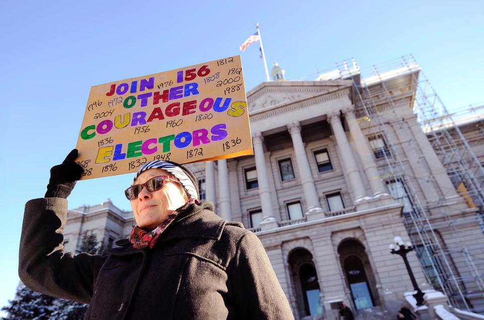 Amber Dahlin urged Colorado electors to vote their conscience outside the state Capitol in Denver on Dec. 19, 2016, as the 538 members of the Electoral College confirmed Donald Trump's election.