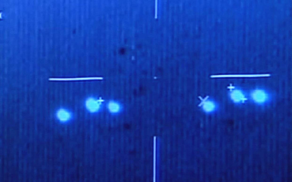 Unidentified flying objects in the skies over southern Campeche state, in images captured by Mexican Air Force pilots on March 5, 2004, according to a Defense Department spokesman - AP Photo