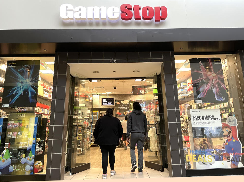SAN RAFAEL, CALIFORNIA - DECEMBER 08: Customers enter a GameStop store on December 08, 2021 in San Rafael, California. Video game retailer GameStop will report third quarter earnings today after the closing bell. (Photo by Justin Sullivan/Getty Images)