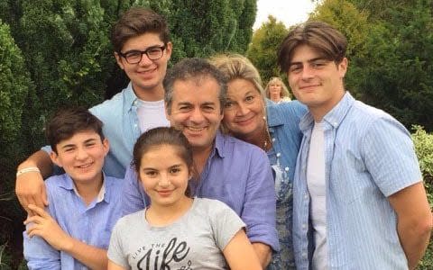 Bernie and Jacinta with children, clockwise from front, Matilda, Oscar, Felix and Theo - Credit:  John Lawrence