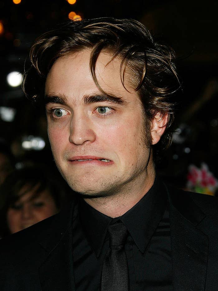 Robert Pattinson making a funny face on the red carpet