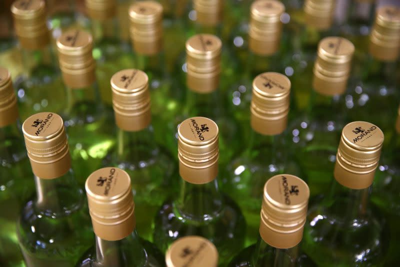 Bottles of pear and mint alcohol are pictured at Swiss distiller Morand in Martigny