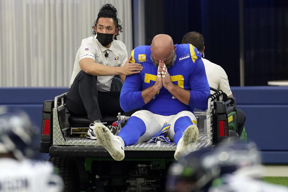 Los Angeles Rams offensive tackle Andrew Whitworth reacts as he leave the game with an injury during the second half of an NFL football game Sunday, Nov. 15, 2020, in Inglewood, Calif. (AP Photo/Ashley Landis)