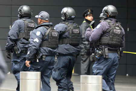 Police are pictured outside the Time Warner Center in the Manahattan borough of New York City after a suspicious package was found inside the CNN Headquarters in New York, U.S., October 24, 2018. REUTERS/Kevin Coombs