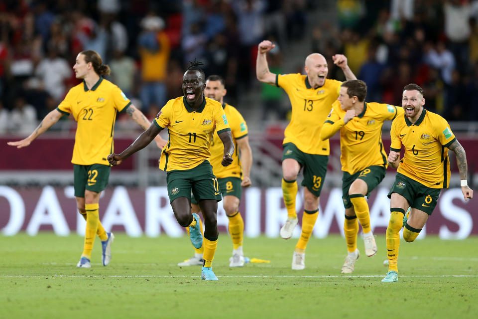 Australia (pictured) sprint towards their goalkeeper as they celebrate defeating Peru to reach the World Cup.