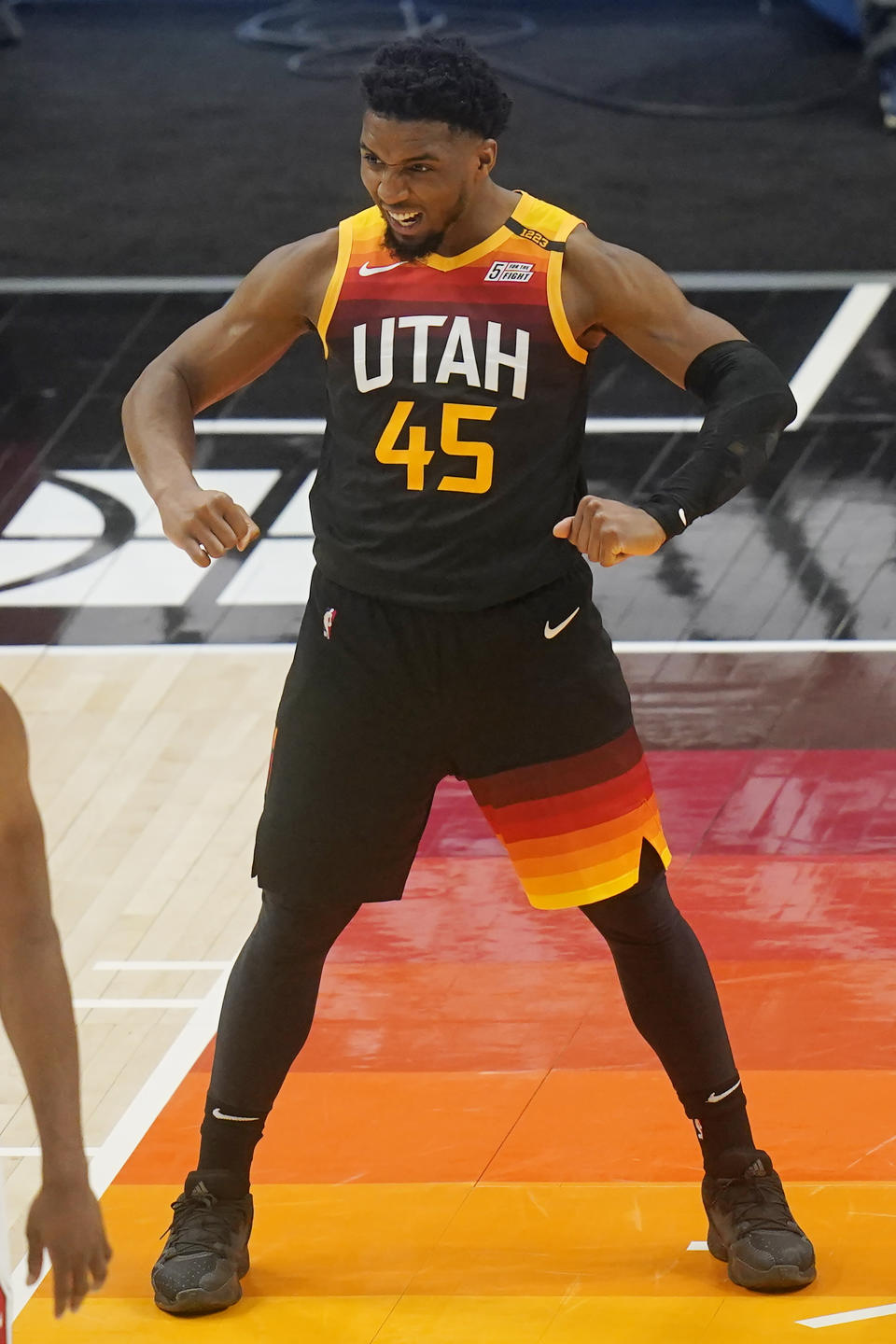 Utah Jazz guard Donovan Mitchell (45) flexes his muscles in the second half during an NBA basketball game against the Chicago Bulls, Friday, April 2, 2021, in Salt Lake City. (AP Photo/Rick Bowmer)