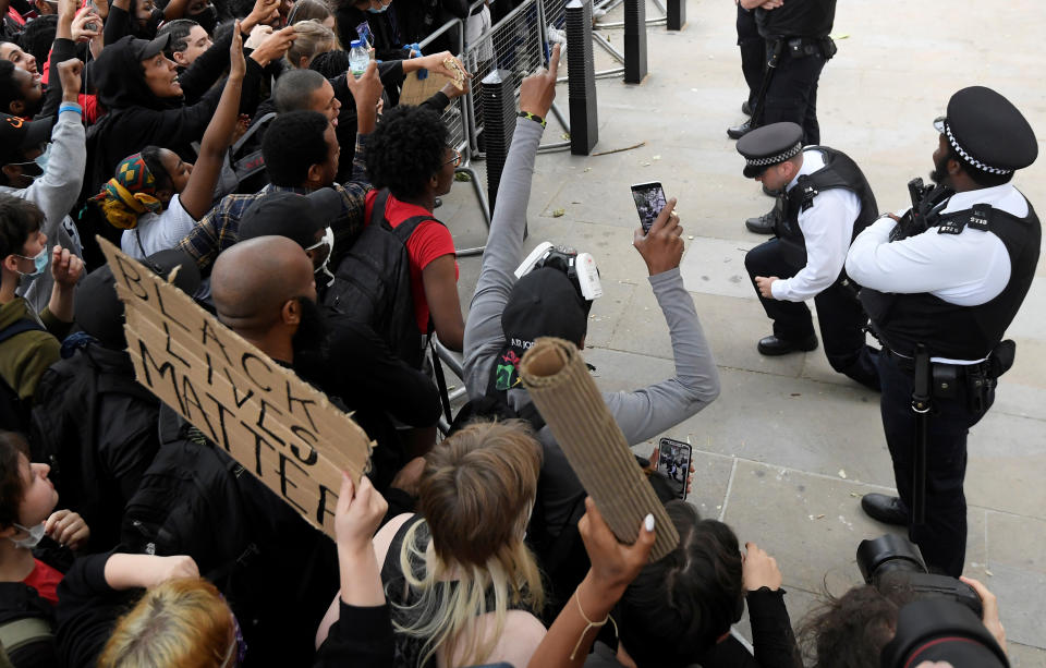 Some police officers spontaneously took the knee in front of protesters near Downing Street during a Black Lives Matter protest following the death of George Floyd. (Picture: REUTERS/Toby Melville)