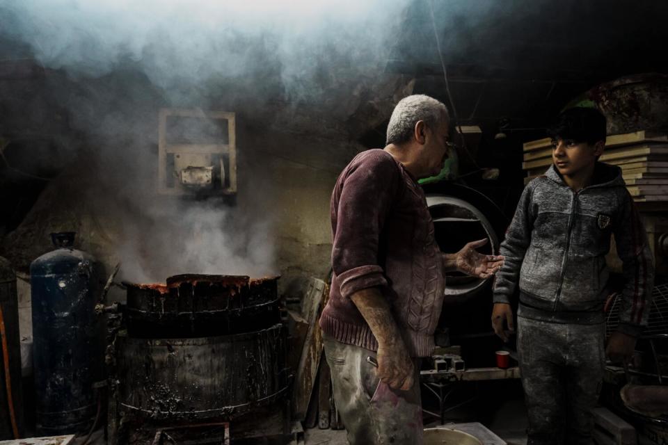 Turkish delight maker and a helper in their workshop