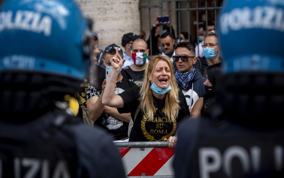 Protestors gathered in Rome to express their anger at the Italian government's response to the economic crisis caused by the novel coronavirus pandemic - Antonio Masiello/Getty Images Europe