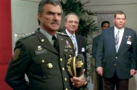 <p>Reynolds appeared onscreen as General Newton in the 1997 movie. (Photo: TM & © Universal) </p>