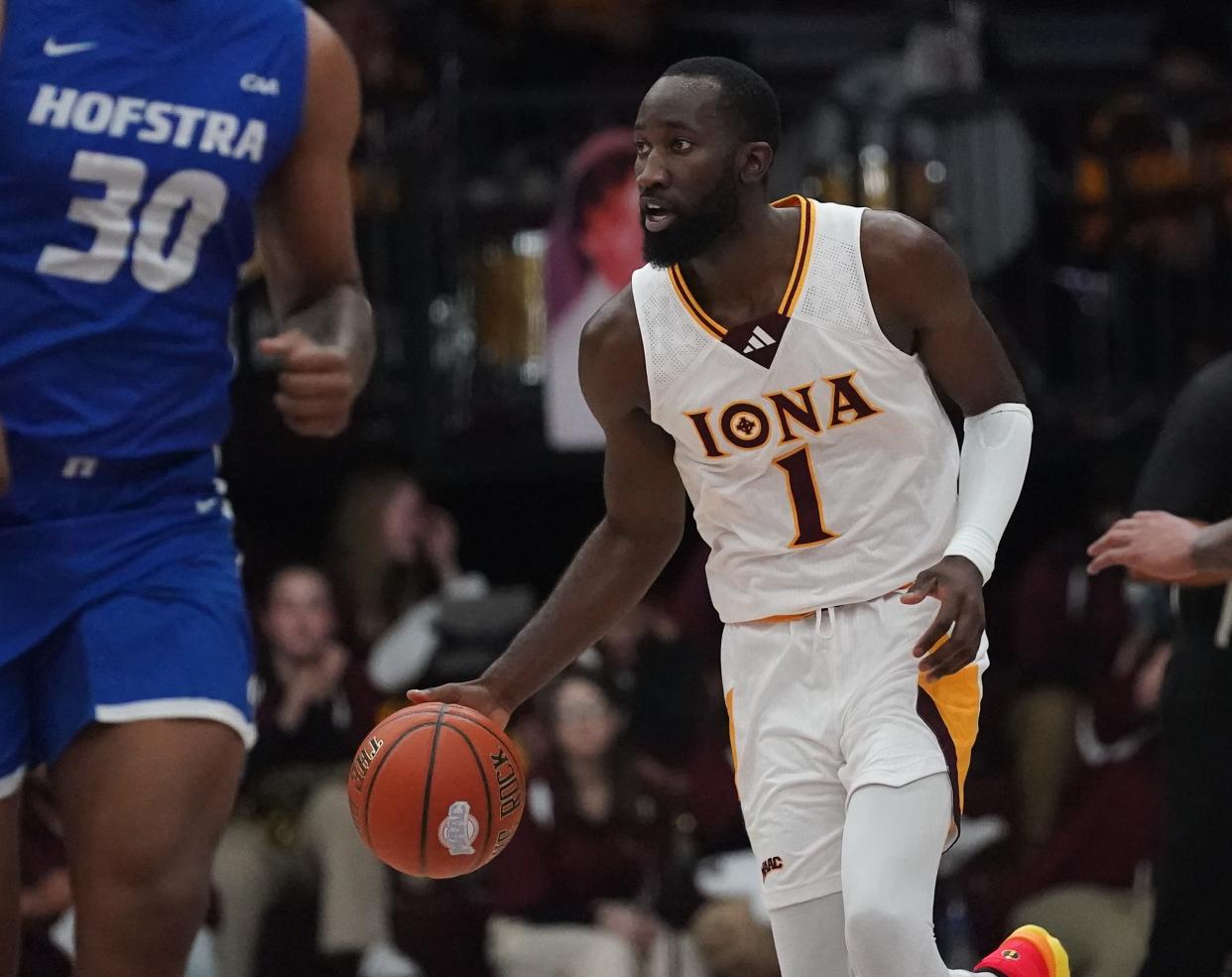 Iona guard Wheza Panzo (1) works the ball during NCAA mens basketball action against Hofstra at Iona University in New Rochelle on Wednesday, Dec 6, 2023.