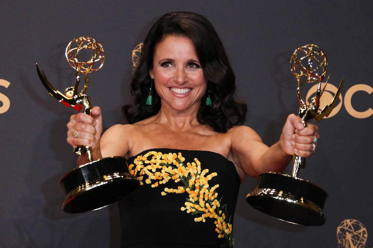 Julia Louis-Dreyfus, seen here holding outstanding-actress and comedy-series Emmys for 