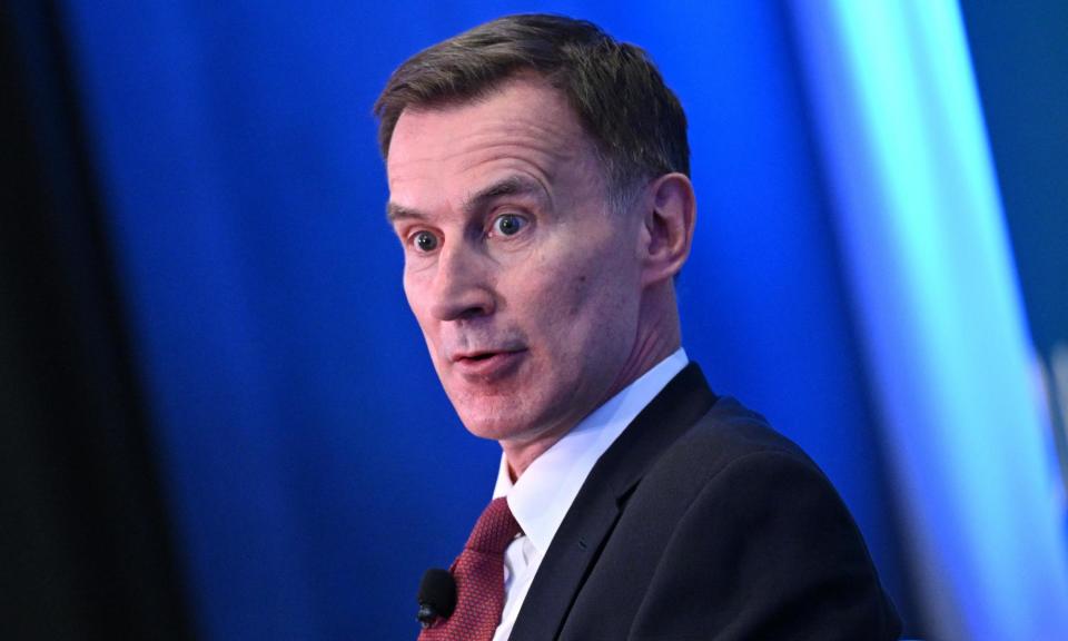 <span>Jeremy Hunt will have been disappointed if he was expecting more scope for tax cuts, an analyst said.</span><span>Photograph: Mandel Ngan/AFP/Getty Images</span>