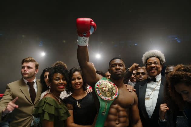 Trevante Rhodes (second from right) and Russell Hornsby (far right) as boxer Mike Tyson and promoter Don King in the Hulu series 