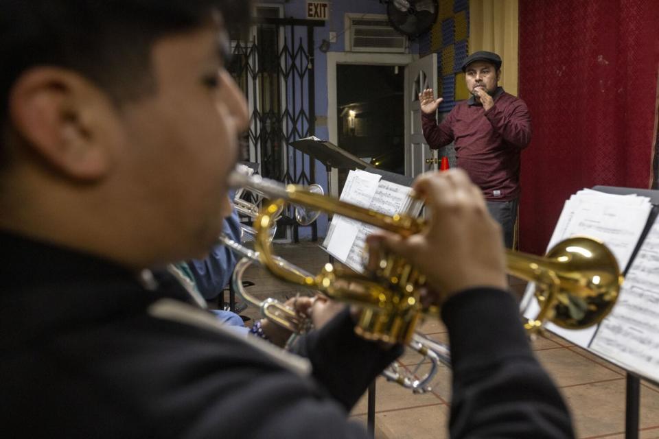 Estanislao Maqueos conducts a band rehearsal at Maqueos Music Academy, where students learn Oaxacan music