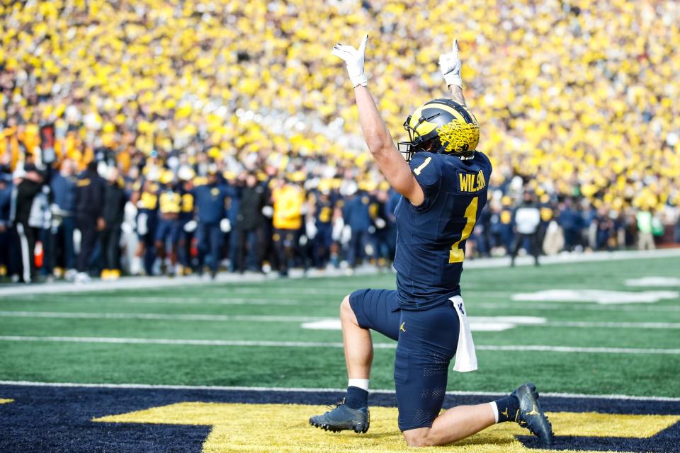 Michigan wide receiver Roman Wilson celebrates a touchdown against Ohio State during the first half at Michigan Stadium in Ann Arbor on Saturday, Nov. 25, 2023.