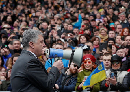 FILE PHOTO: Ukraine's president and candidate in a presidential election next week, Petro Poroshenko, speaks after a failed attempt to hold a debate with his opponent comedian Volodymyr Zelenskiy at the Olimpiyskiy Stadium in Kiev, Ukraine April 14, 2019. REUTERS/Valentyn Ogirenko/File Photo