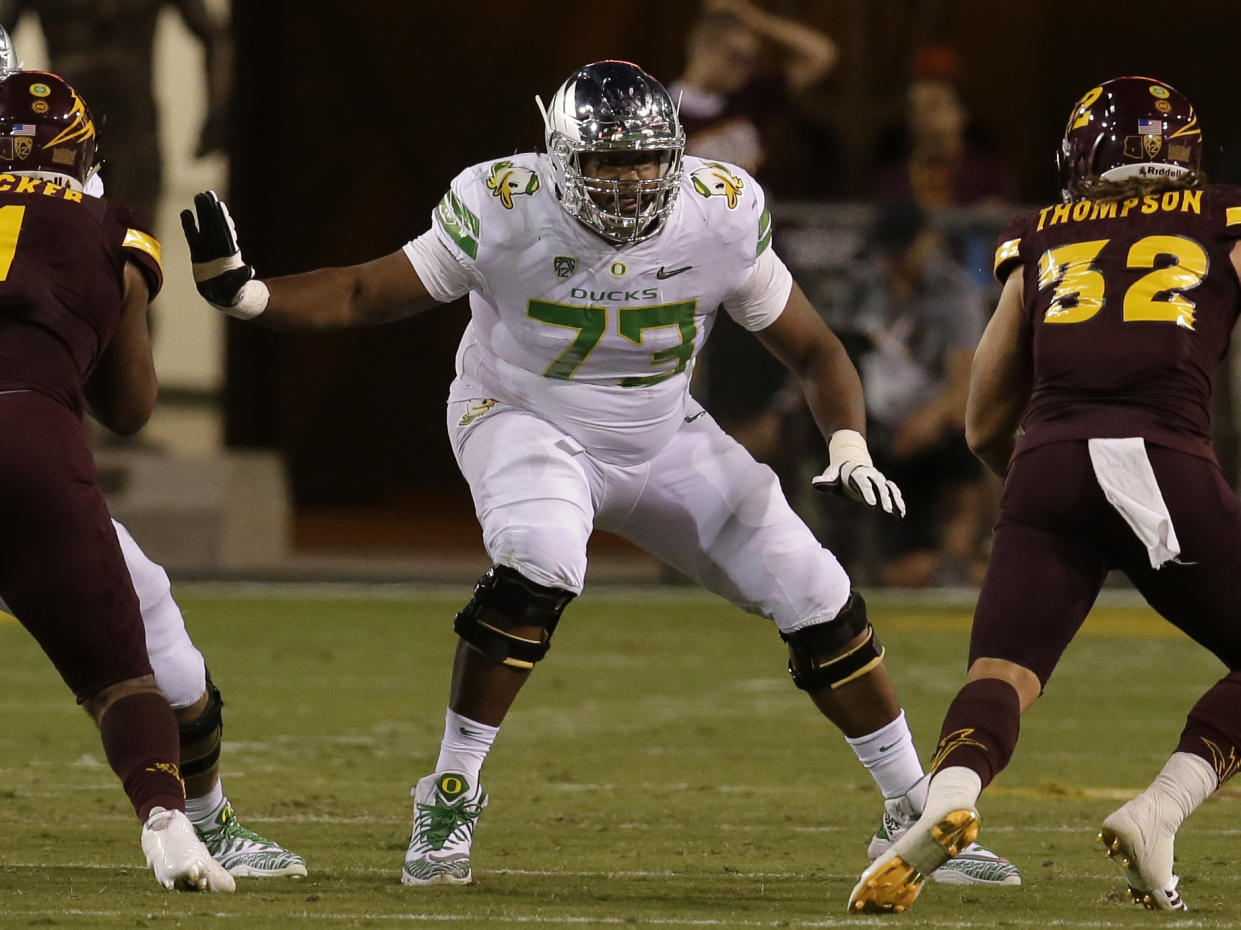 Oregon offensive lineman Tyrell Crosby (73) in the first half during an NCAA college football game against Arizona State, Saturday, Sept. 23, 2017, in Tempe, Ariz. (AP Photo/Rick Scuteri)