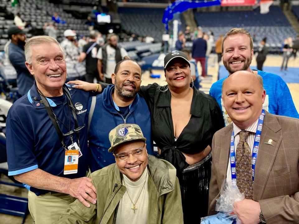 LaVelt Hill (2nd from left) posed for a photo with, from left to right, fellow usher Joe Newman; season ticket holder Adrian Shavers; Cynthia Johnson, the mother of former Grizzlies player Jevon Carter; and Grizzlies television announcer Pete Pranica.